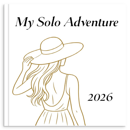 Solo travel photo book with gold line illustration inspired by independent travel and adventure